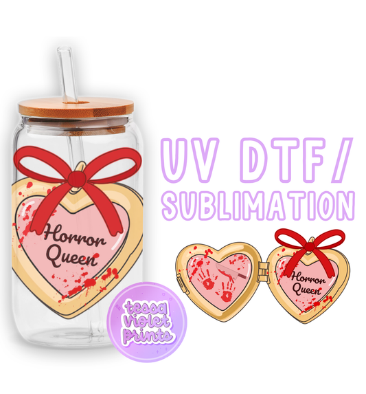 a jar with a heart shaped cookie in it