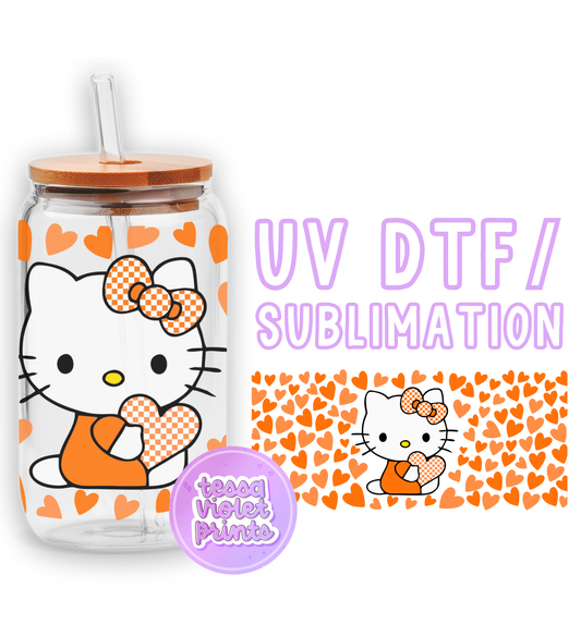 a hello kitty drink bottle with a straw in it