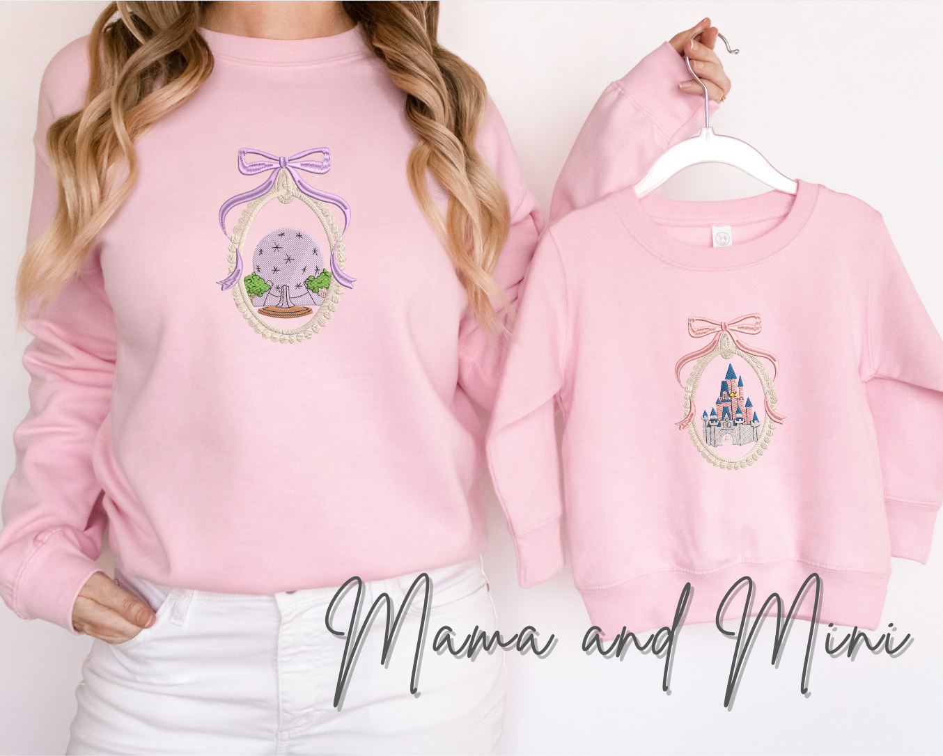 a woman wearing a pink sweatshirt and white jeans