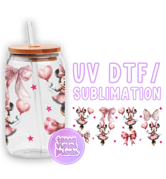 a glass cup with a minnie mouse design on it