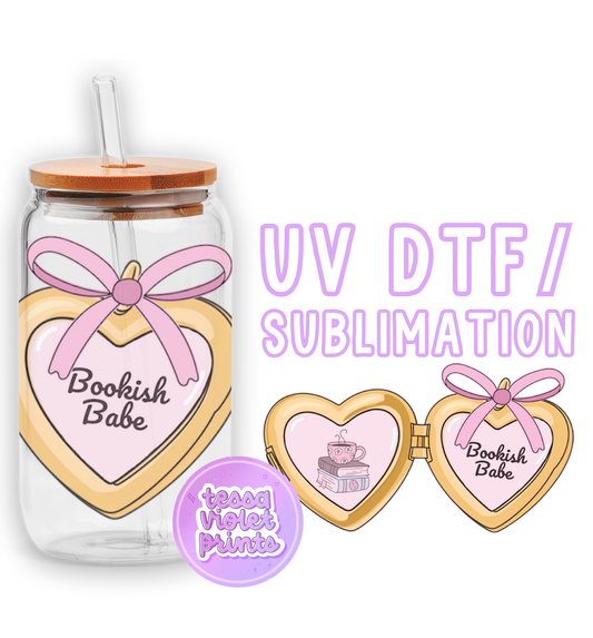 a glass jar with a pink ribbon and two hearts on it