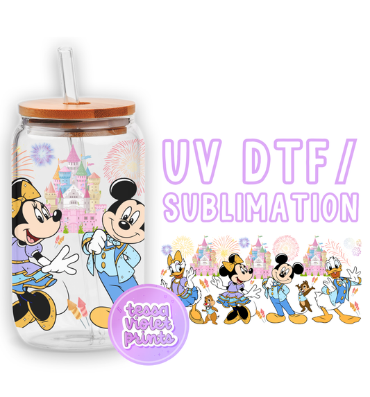 a glass with a mickey mouse cartoon on it