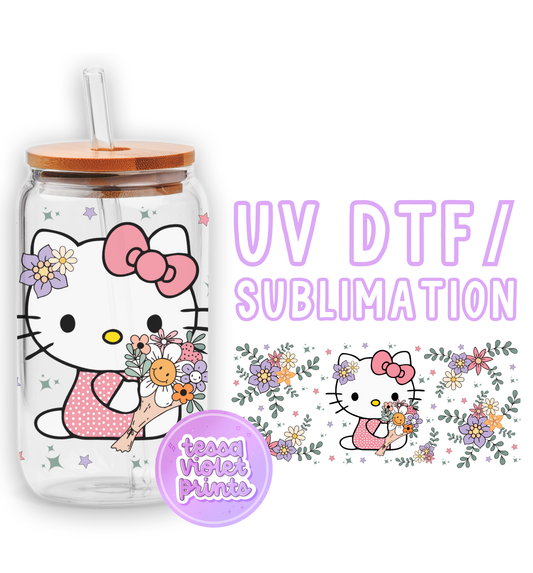 a hello kitty water bottle with a straw in it