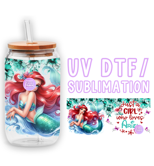 a glass jar with a picture of a mermaid on it