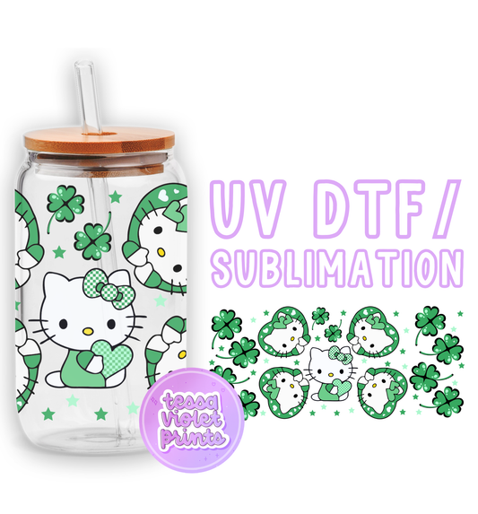 a glass jar with a hello kitty design on it