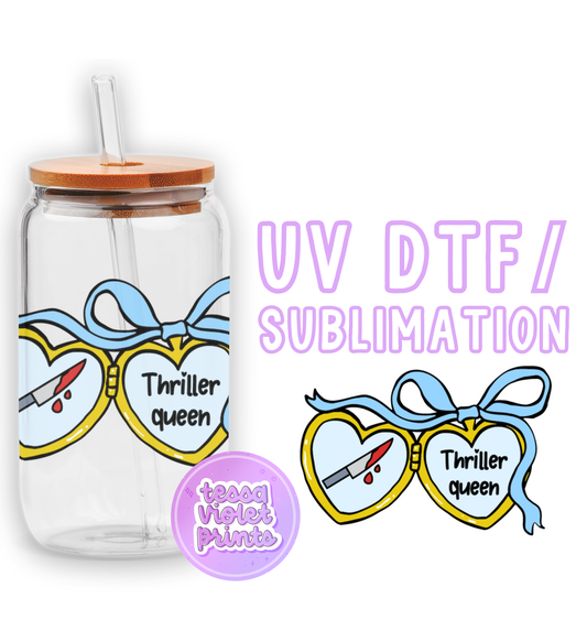 a glass jar with a straw lid and a straw in the shape of a heart