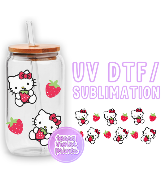 a glass jar with strawberries and hello kitty stickers on it