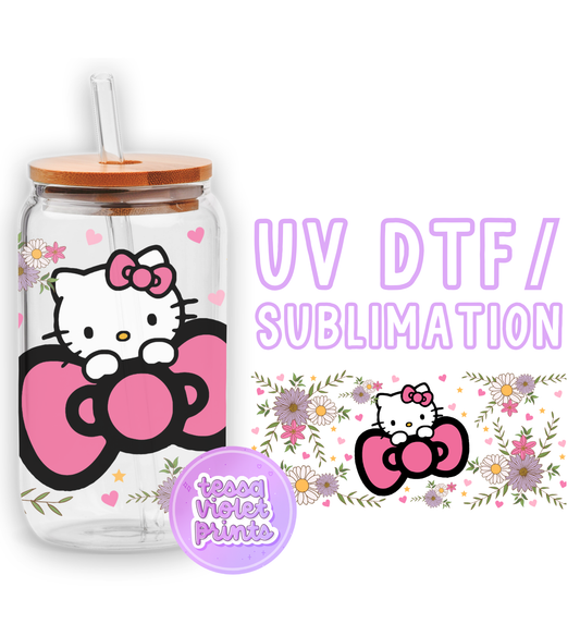 a hello kitty drink bottle with a straw in it