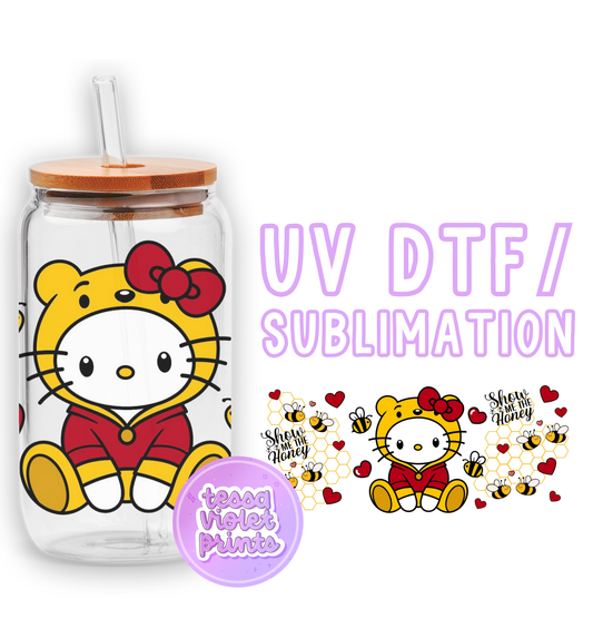 a picture of a hello kitty drinking bottle with a straw